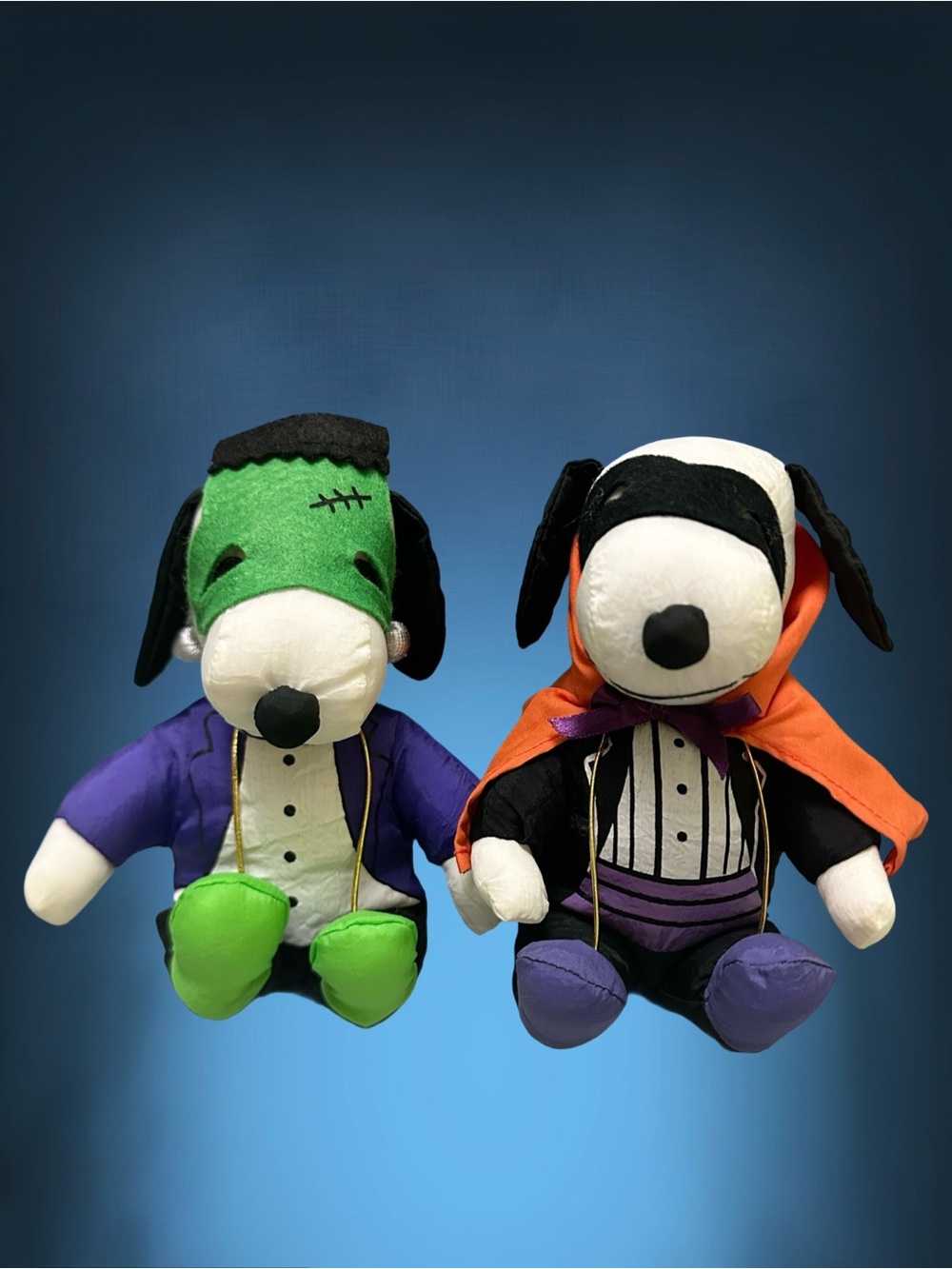 Peanuts Plush Dog Toy Duo - Green, Orange, Purple & Black Costumes
